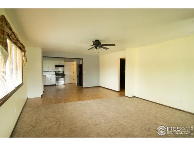 a view of a room with a window