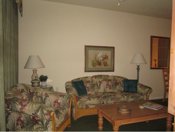 7920 Mahogany Run Lane, Unit 1024 Naples, FL 34113 - Photo 9 of 18 a living room with furniture and a couch