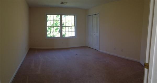 13 Wrentham Road Worcester, MA 01602 - Photo 14 of 18 an empty room with a window