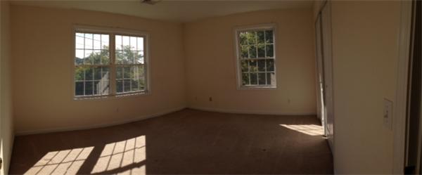 13 Wrentham Road Worcester, MA 01602 - Photo 6 of 18 a view of an empty room with a window