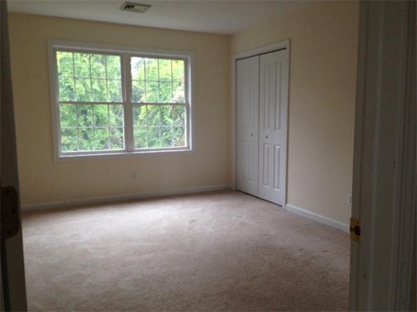 13 Wrentham Road Worcester, MA 01602 - Photo 7 of 18 an empty room with a window