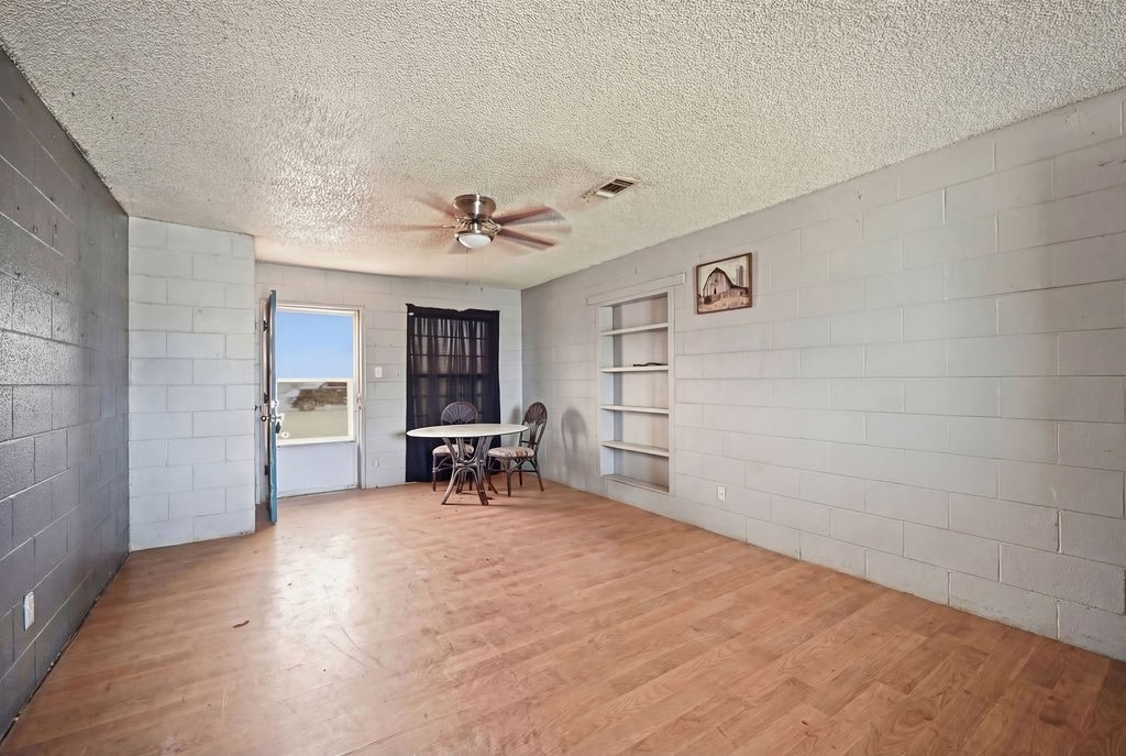 508 South Kenneth Avenue Monahans, TX 79756 - Photo 1 of 39 a view of a livingroom with chairs and a workspace
