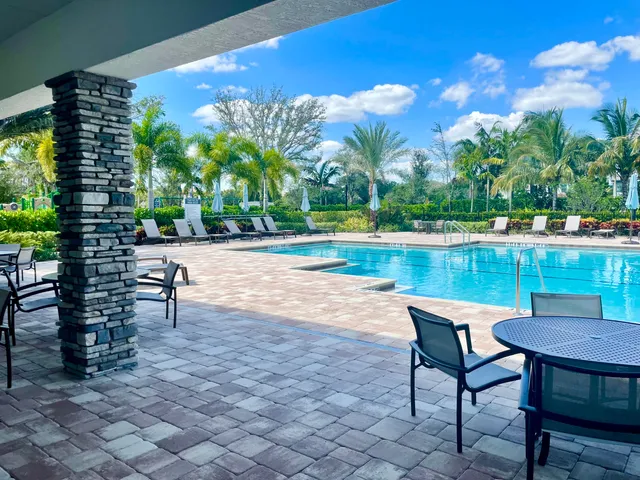 a view of a living room and kitchen view