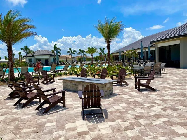a view of a park with palm trees