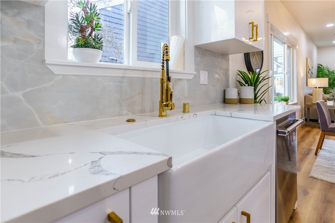 1129 North 84th Street Seattle, WA 98103 - Photo 7 of 24 a bathroom with a bathtub and a sink