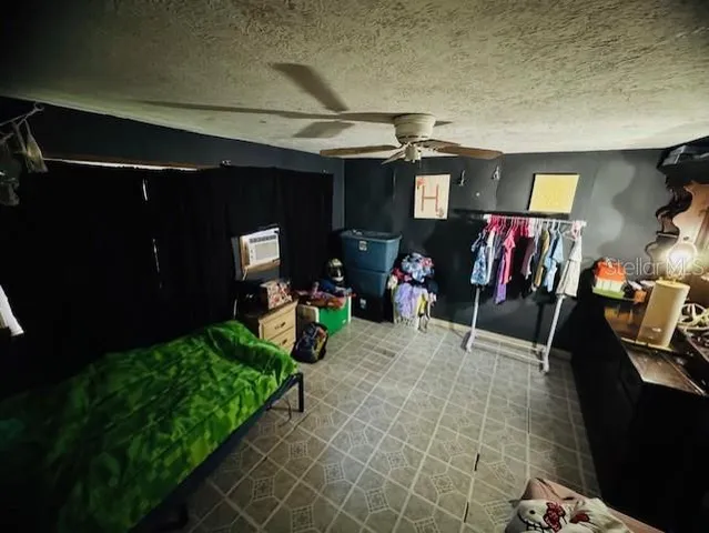 an outdoor view with a sitting space and trees