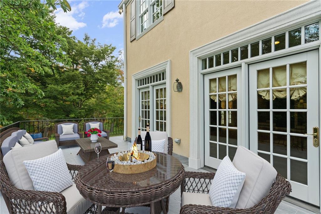 73 Stonedale Road Sewickley, PA 15143 - Photo 12 of 50 a view of a house with a table and chair