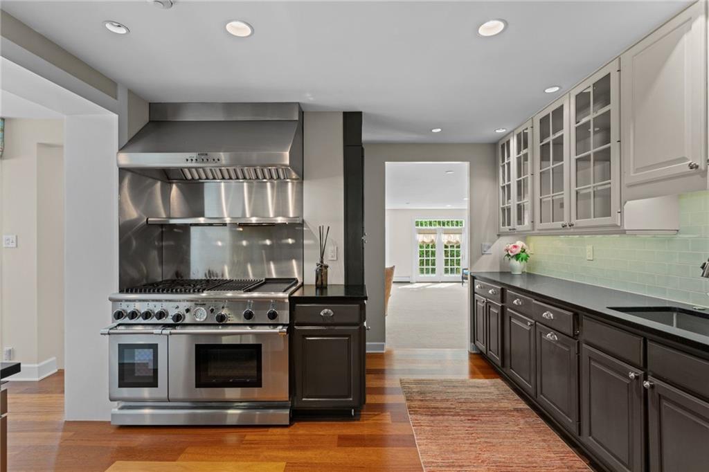 73 Stonedale Road Sewickley, PA 15143 - Photo 13 of 50 a kitchen with stainless steel appliances a stove and a refrigerator