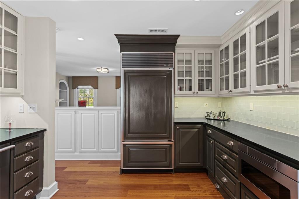 73 Stonedale Road Sewickley, PA 15143 - Photo 14 of 50 a kitchen with stainless steel appliances granite countertop a refrigerator and a stove top oven