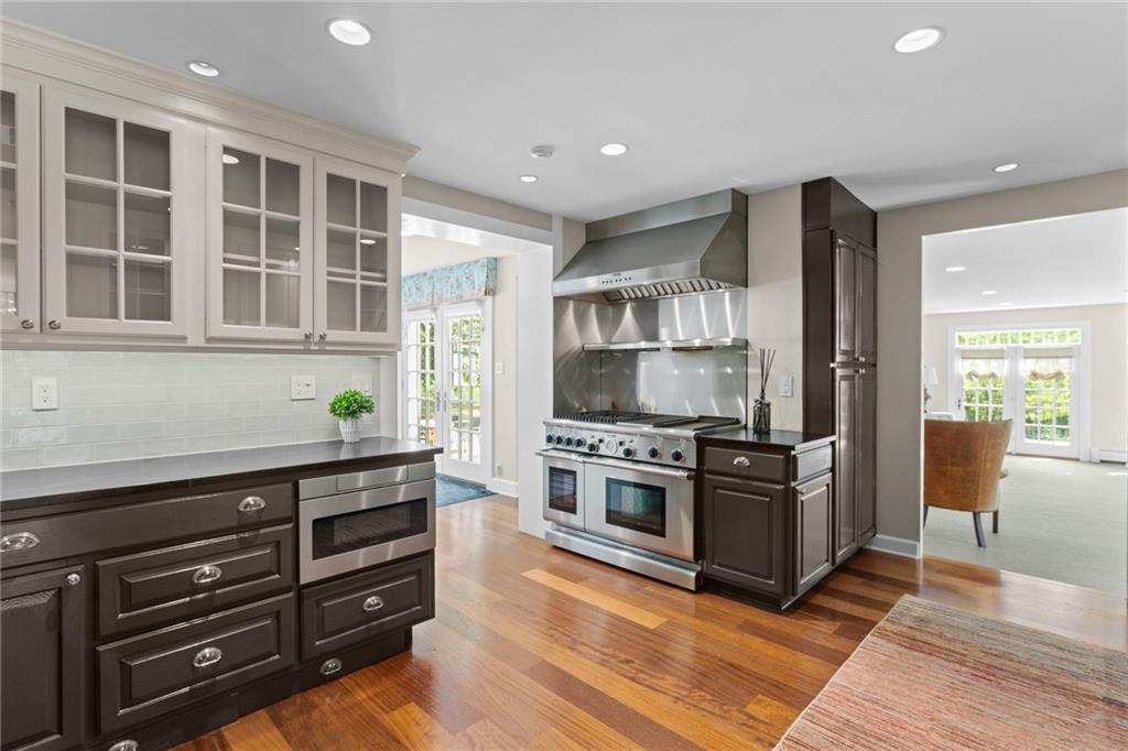 73 Stonedale Road Sewickley, PA 15143 - Photo 15 of 50 a kitchen with stainless steel appliances granite countertop a stove and a sink