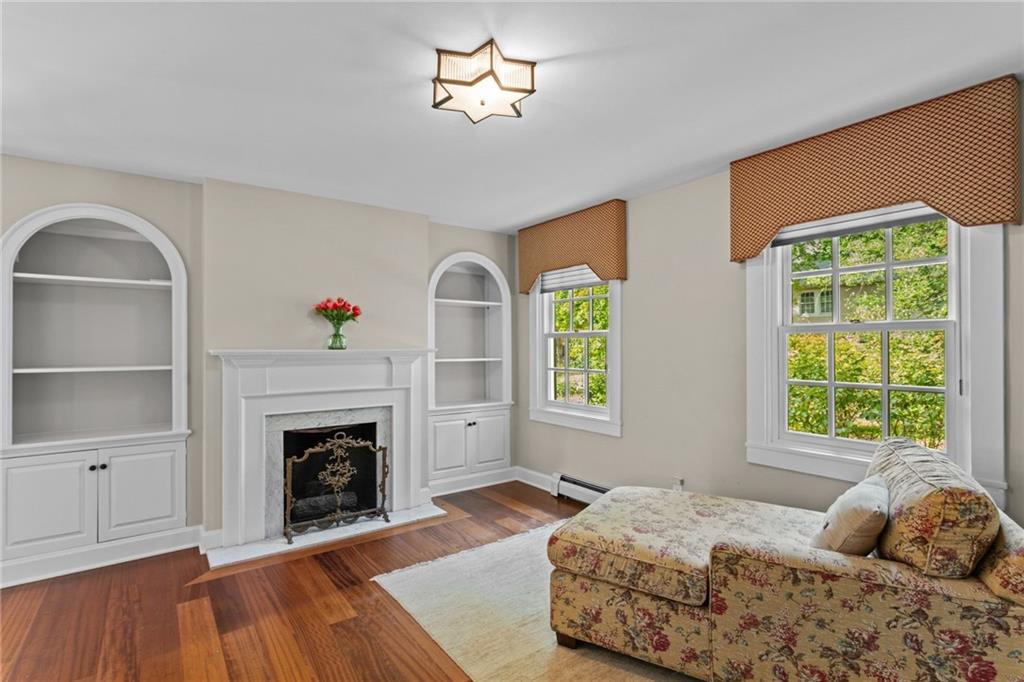 73 Stonedale Road Sewickley, PA 15143 - Photo 23 of 50 a bedroom with a bed and a fireplace