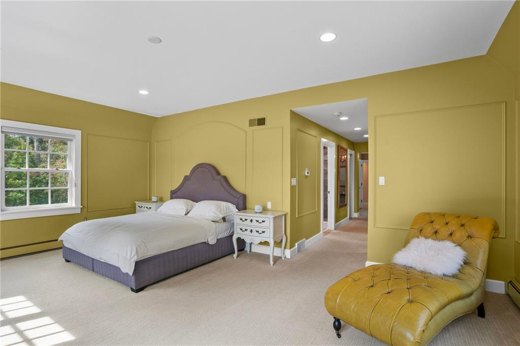 73 Stonedale Road Sewickley, PA 15143 - Photo 31 of 50 a spacious bedroom with a bed and a couch