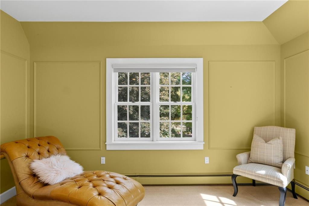 73 Stonedale Road Sewickley, PA 15143 - Photo 32 of 50 a bedroom with a bed and a chair