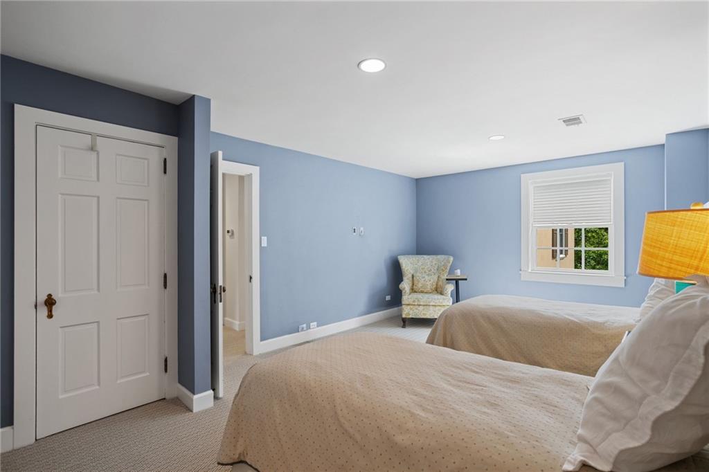 73 Stonedale Road Sewickley, PA 15143 - Photo 36 of 50 a bedroom with a bed and a lamp