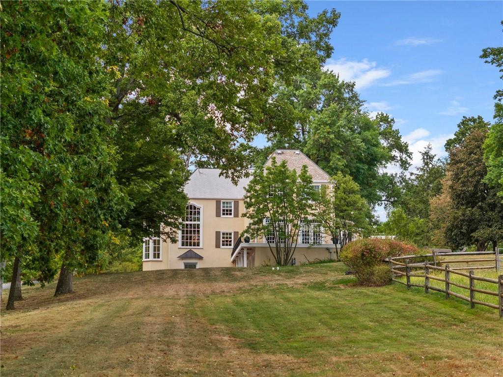 73 Stonedale Road Sewickley, PA 15143 - Photo 43 of 50 a front view of a house with garden