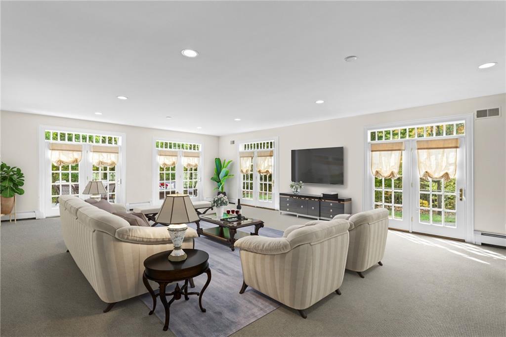 73 Stonedale Road Sewickley, PA 15143 - Photo 10 of 50 a living room with furniture and a flat screen tv