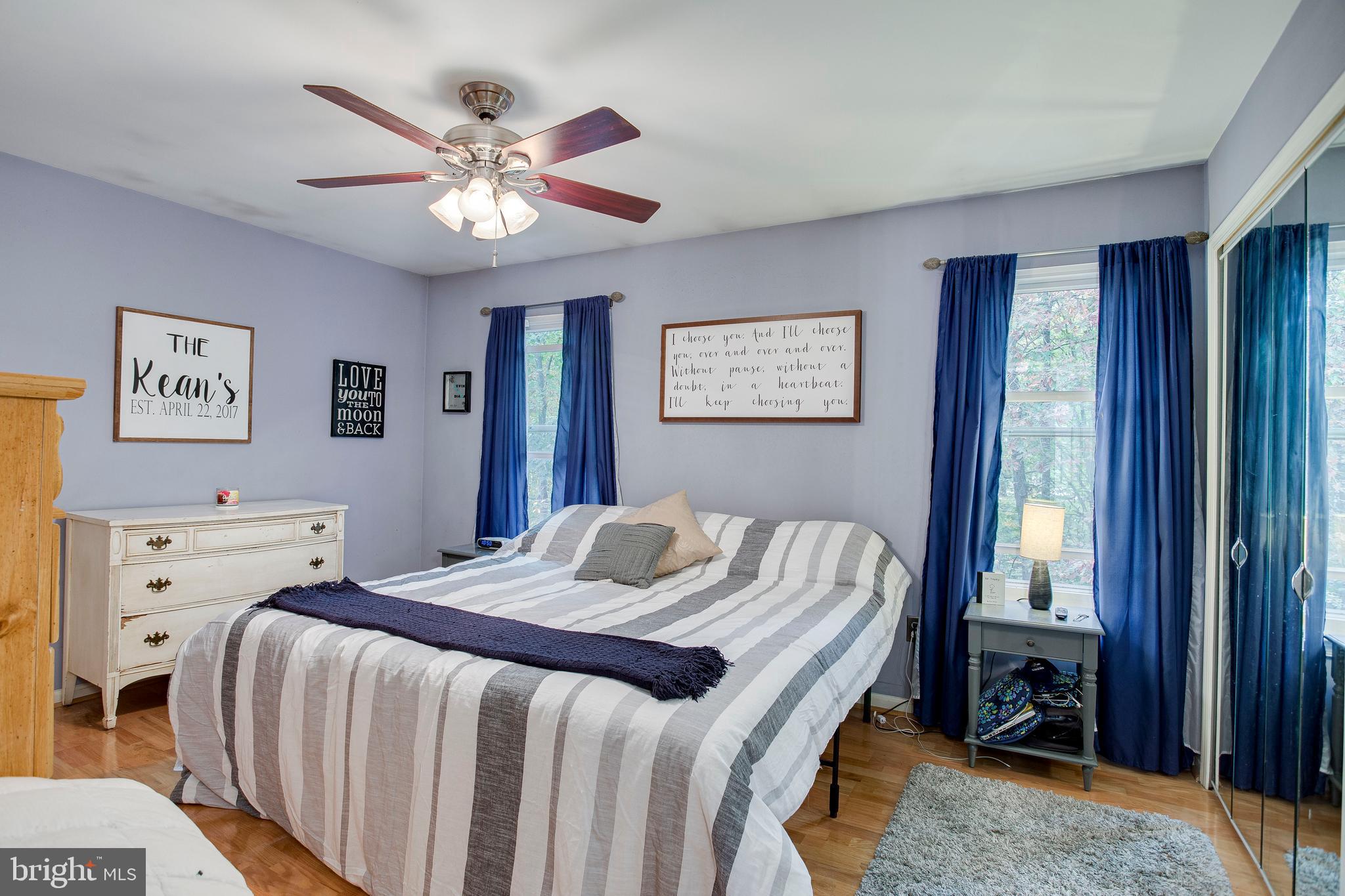 1123 Ingate Road Baltimore, MD 21227 - Photo 14 of 28 Large MBR w/exposed HW + mirrored closets doors