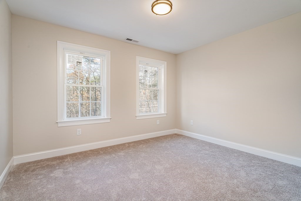 117 Center Road Shirley, MA 01464 - Photo 29 of 42 an empty room with windows