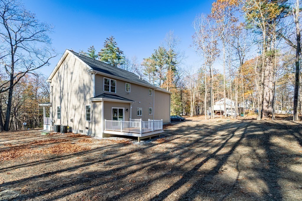 117 Center Road Shirley, MA 01464 - Photo 36 of 42 a view of a house with a yard