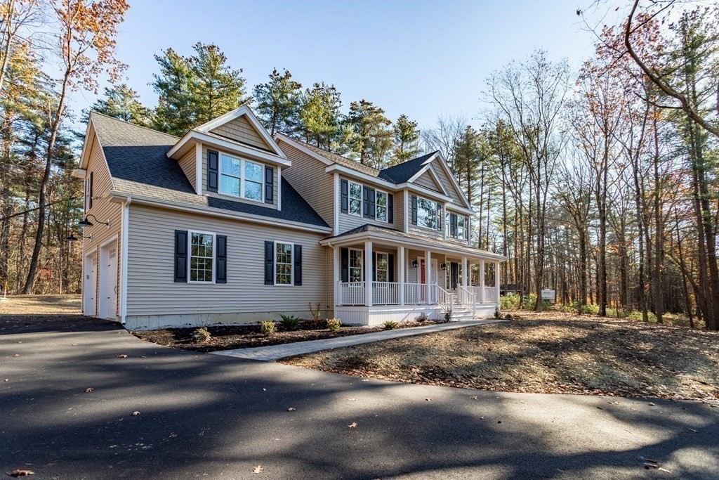 117 Center Road Shirley, MA 01464 - Photo 40 of 42 a front view of a house with a yard