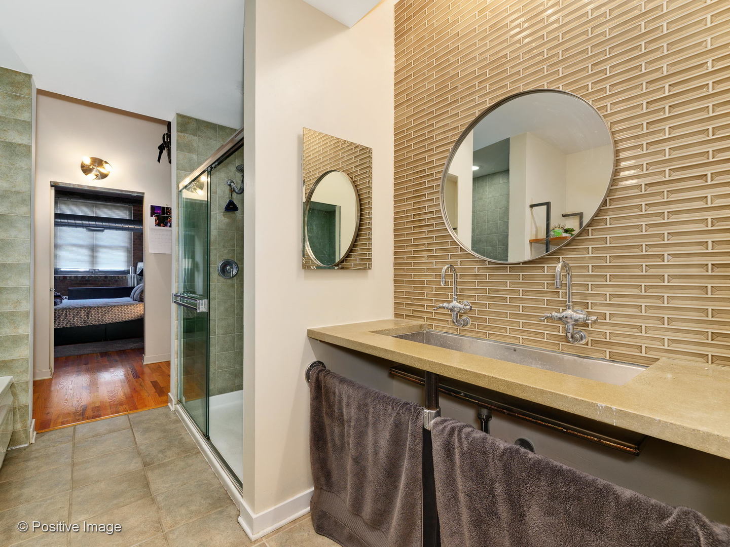 Undisclosed Address Chicago, IL 60616 - Photo 13 of 18 a bathroom with a sink and a mirror