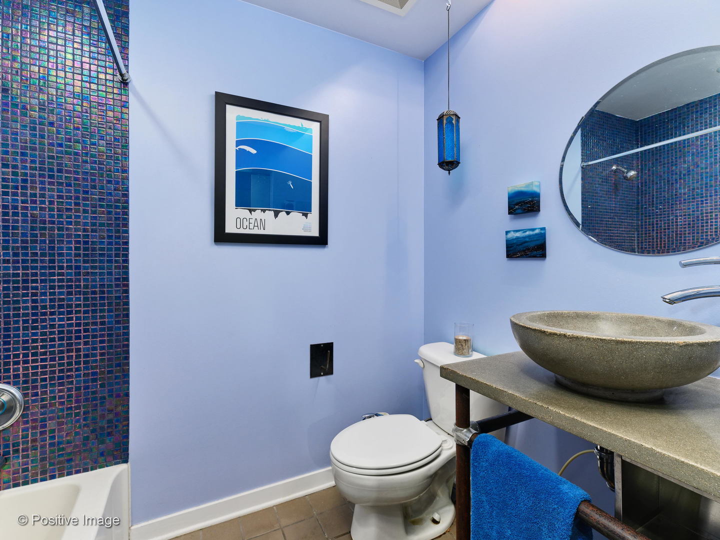 Undisclosed Address Chicago, IL 60616 - Photo 16 of 18 a bathroom with a toilet and a mirror