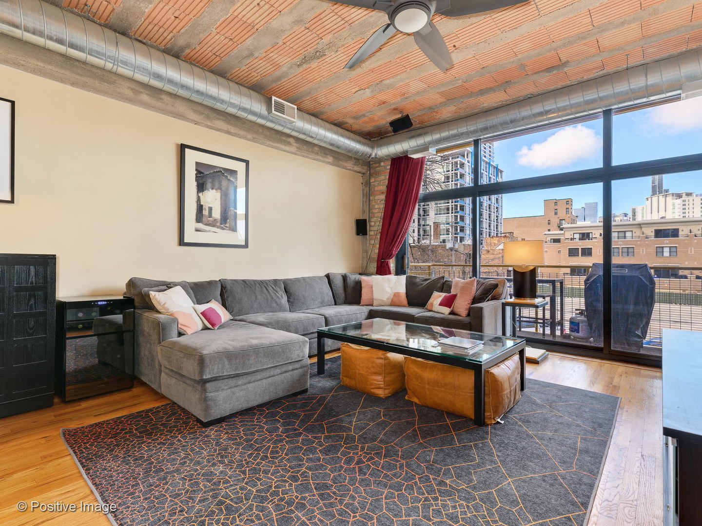 Undisclosed Address Chicago, IL 60616 - Photo 7 of 18 a living room with furniture and a large window