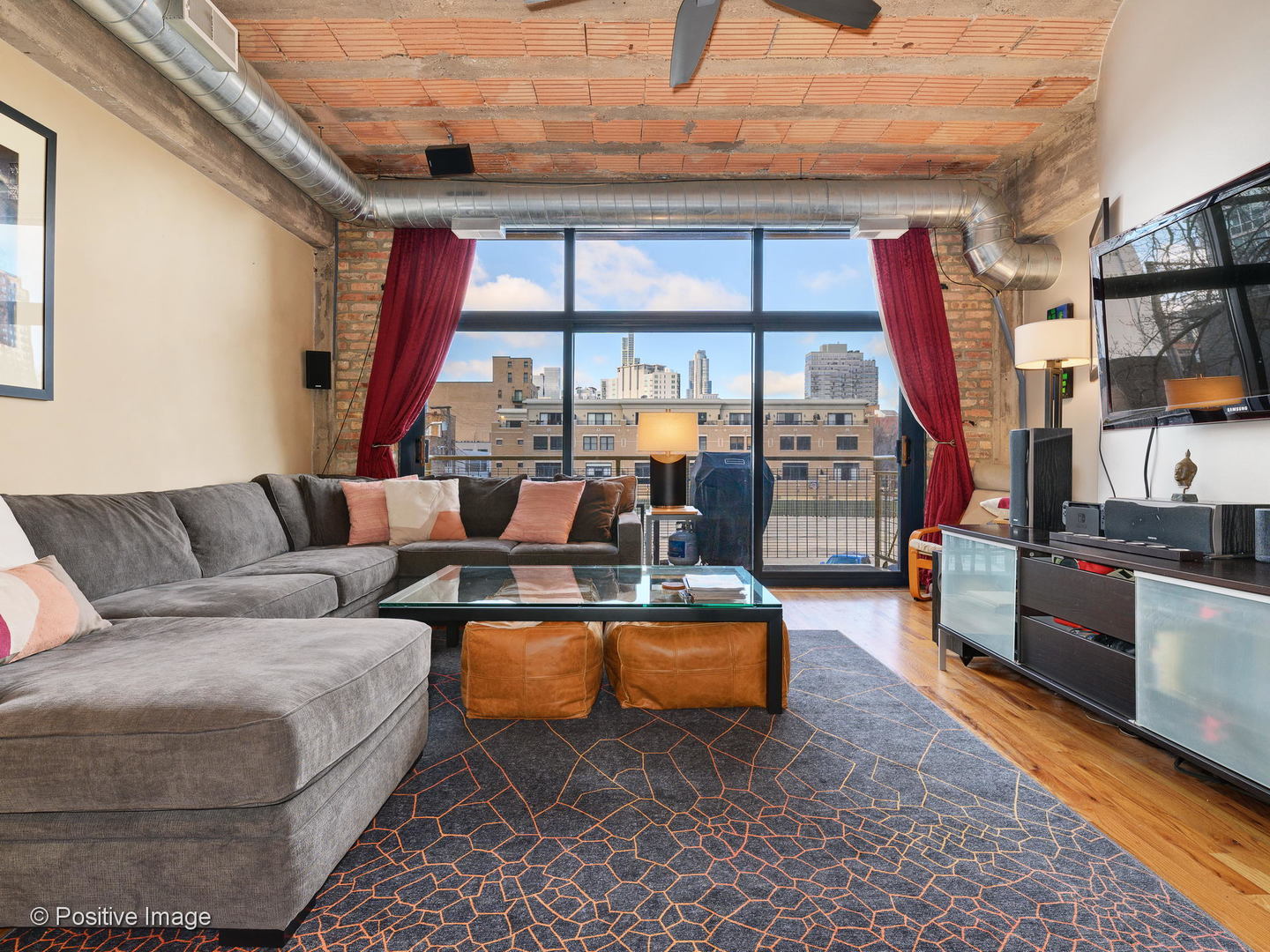Undisclosed Address Chicago, IL 60616 - Photo 10 of 18 a living room with furniture a rug and a large window