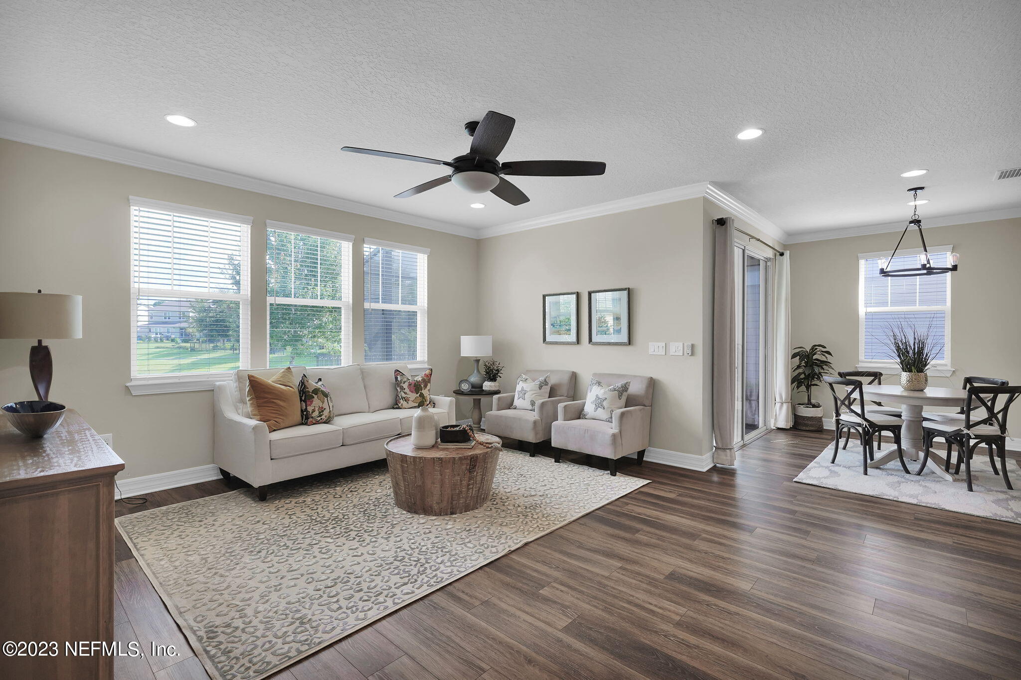 39 Lakefront Lane St. Augustine, FL 32095 - Photo 13 of 66 a living room with furniture and a large window