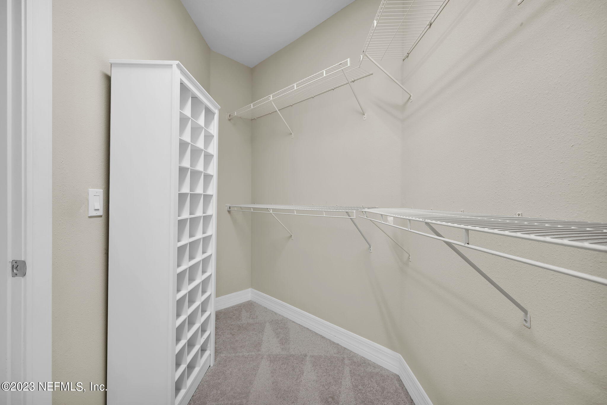 39 Lakefront Lane St. Augustine, FL 32095 - Photo 20 of 66 a view of a room with racks on the wall