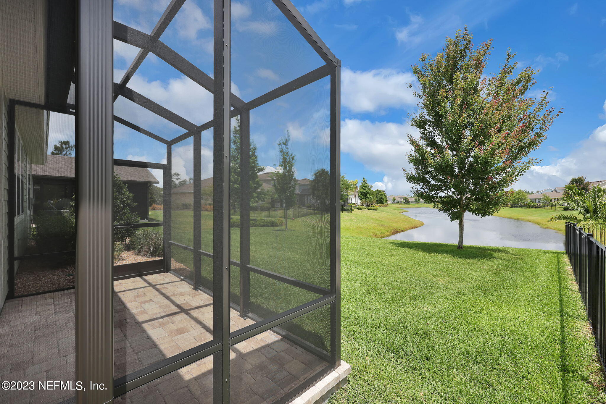 39 Lakefront Lane St. Augustine, FL 32095 - Photo 3 of 66 a view of a glass door and a yard
