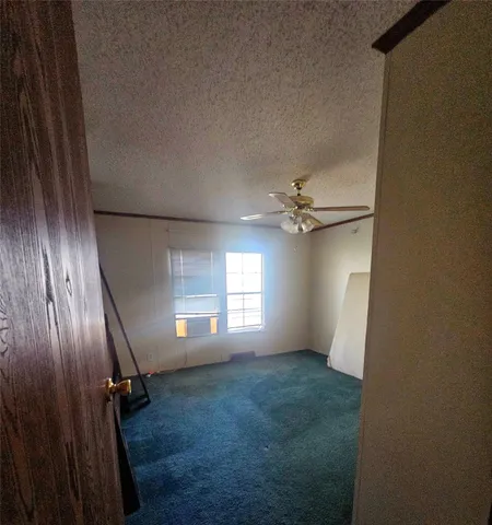 a bathroom with a double vanity sink a large mirror and shower