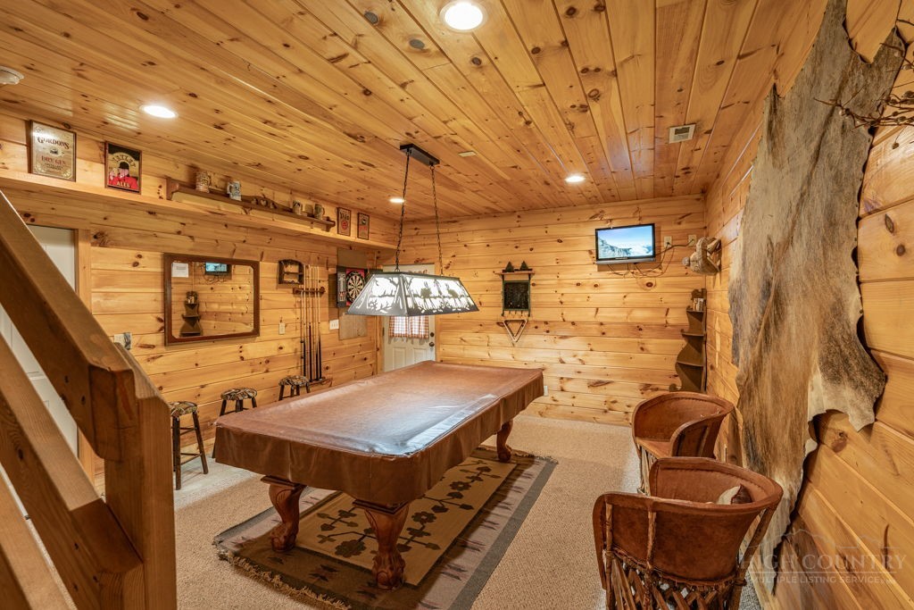 197 Woodby Ridge Road Vilas, NC 28692 - Photo 31 of 45 a view of a livingroom with furniture and a table