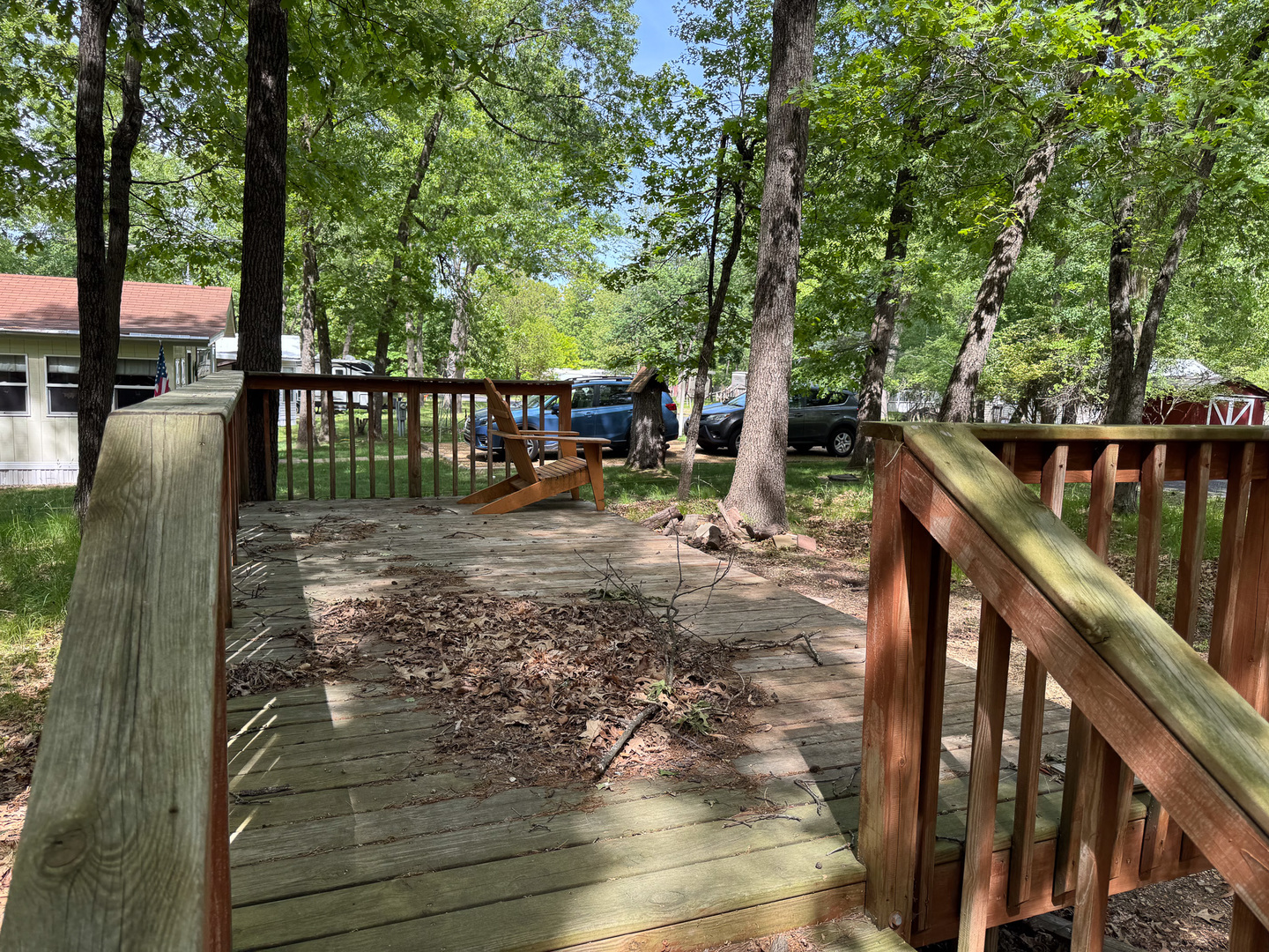 4-50 Woodhaven Sublette, IL 61367 - Photo 2 of 7 a view of deck with chairs and wooden fence