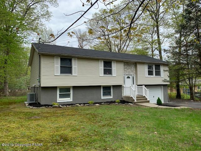 1023 Dancing Ridge Road East Stroudsburg, PA 18302 - Photo 2 of 23 a view of a house with a yard