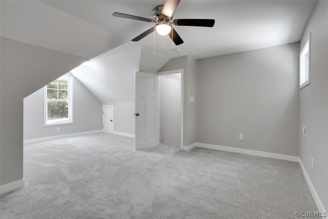 323 Windsor Road Dutton, VA 23050 - Photo 35 of 46 en empty room with windows and ceiling fan