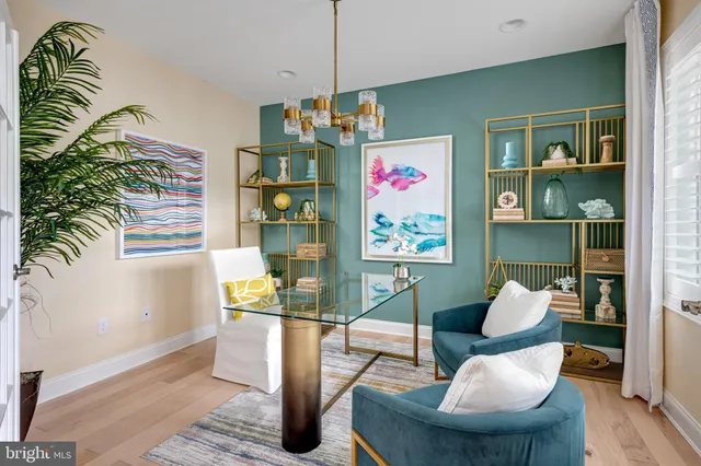 a outdoor living space with furniture and a potted plant