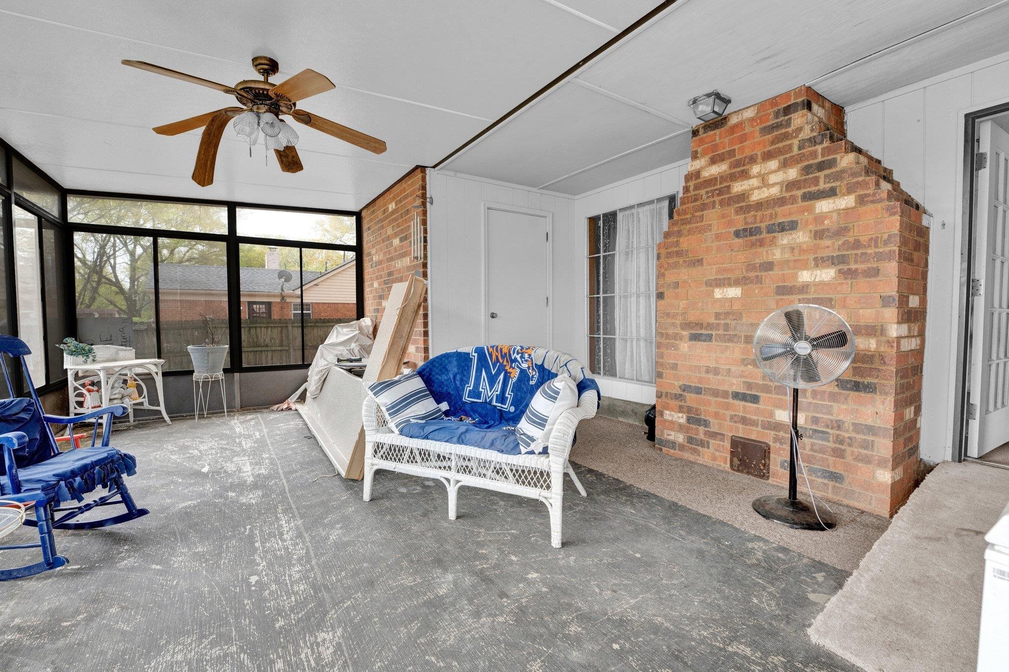 3086 Altruria Road Bartlett, TN 38134 - Photo 15 of 21 a living room with furniture a ceiling fan and a large window