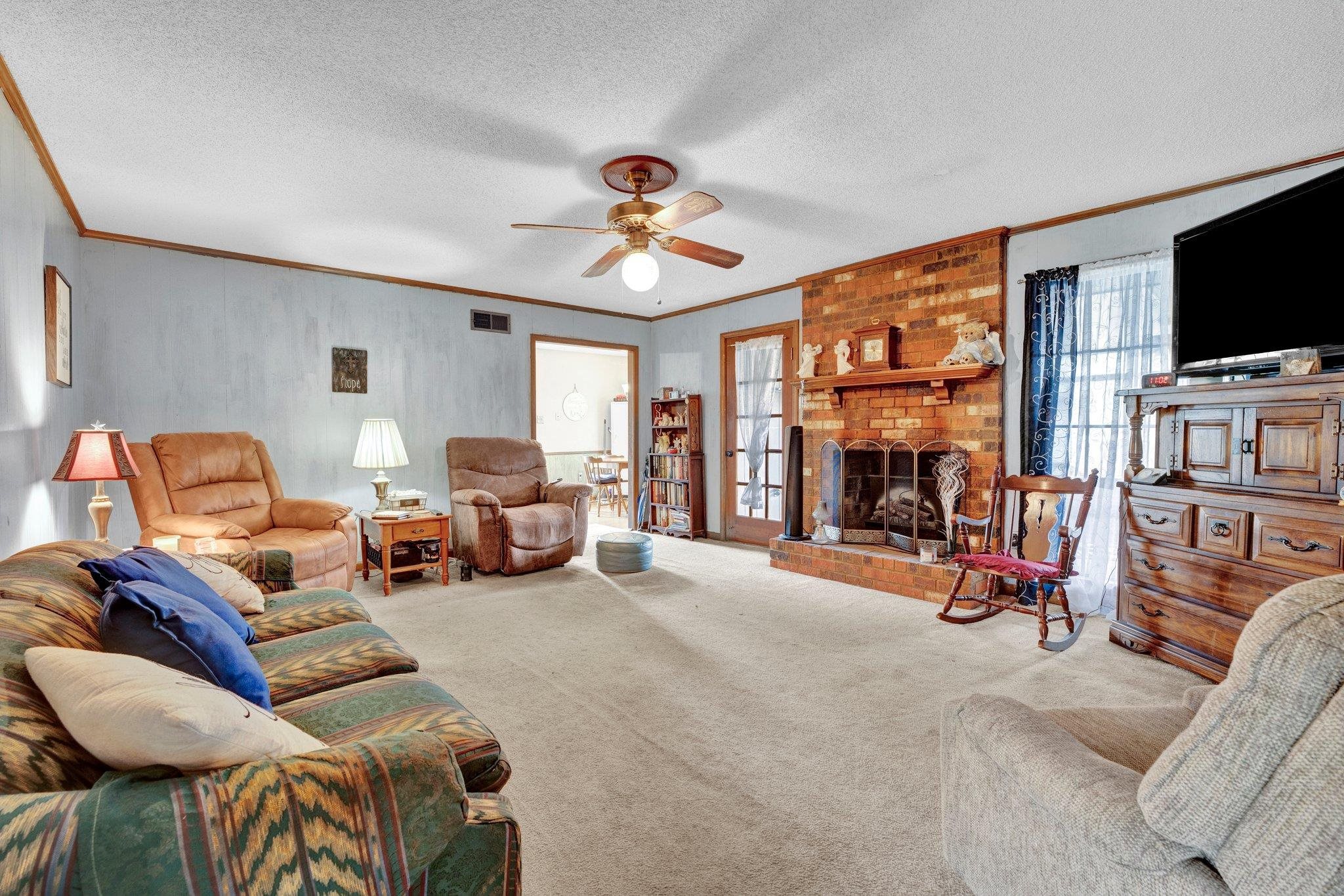 3086 Altruria Road Bartlett, TN 38134 - Photo 9 of 21 a living room with furniture and a flat screen tv