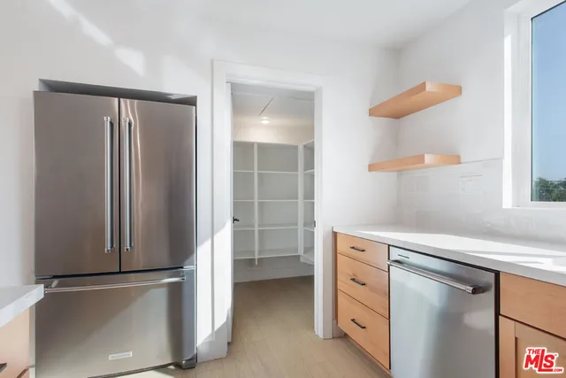 a view of staircase with white walls