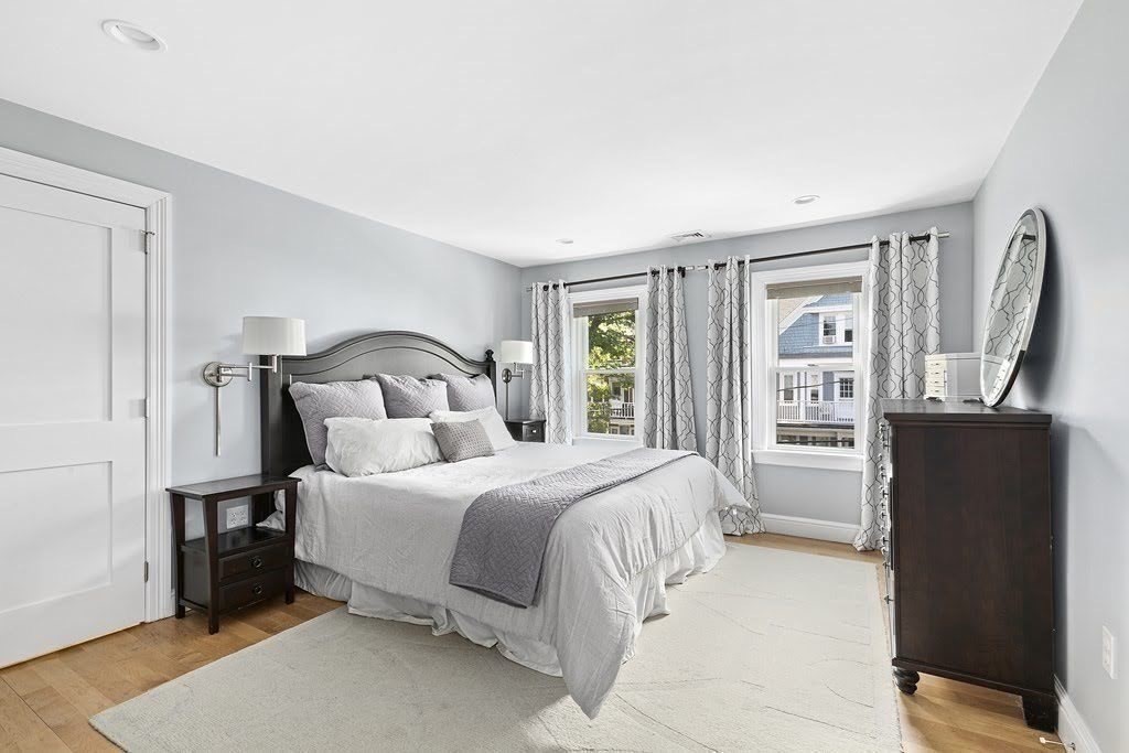 58 Liberty Avenue, Unit 2 Somerville, MA 02144 - Photo 13 of 22 a bedroom with a bed and a dresser