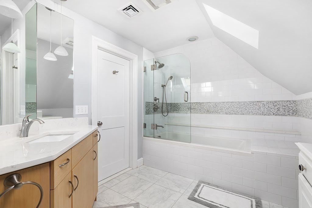58 Liberty Avenue, Unit 2 Somerville, MA 02144 - Photo 14 of 22 a spacious bathroom with a shower and a sink