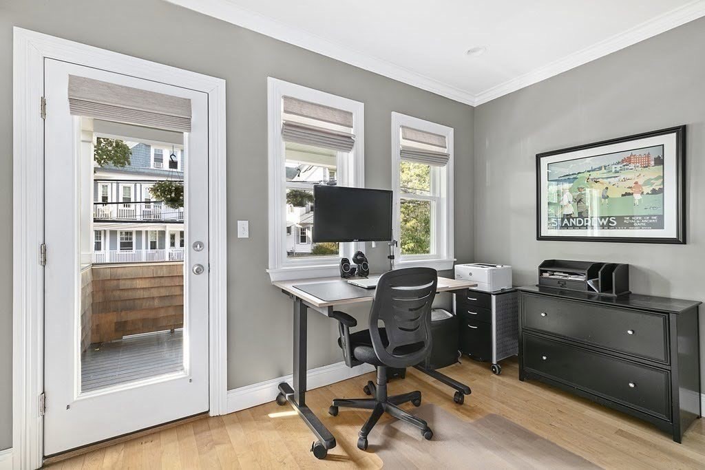 58 Liberty Avenue, Unit 2 Somerville, MA 02144 - Photo 10 of 22 a view of a workspace with furniture and a window