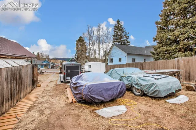 a view of a patio in backyard