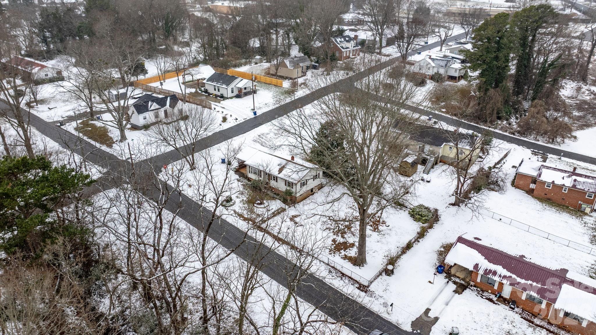 203 3rd Avenue Northeast Conover, NC 28613 - Photo 12 of 30 a view of a yard with a tree