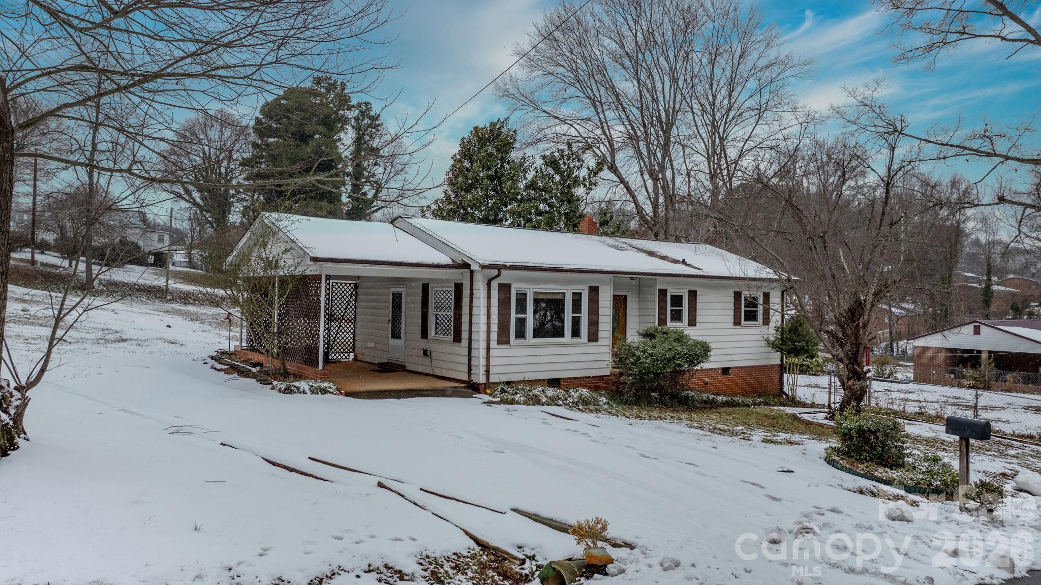 203 3rd Avenue Northeast Conover, NC 28613 - Photo 2 of 30 a view of a house with yard and sitting area