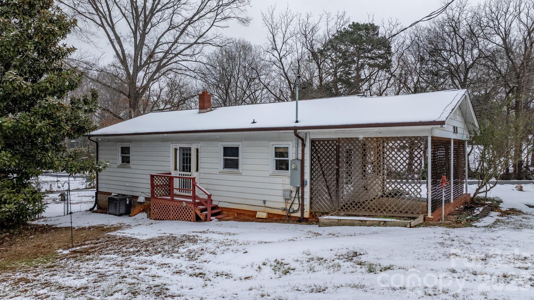 203 3rd Avenue Northeast Conover, NC 28613 - Photo 7 of 30 a view of a small house with backyard