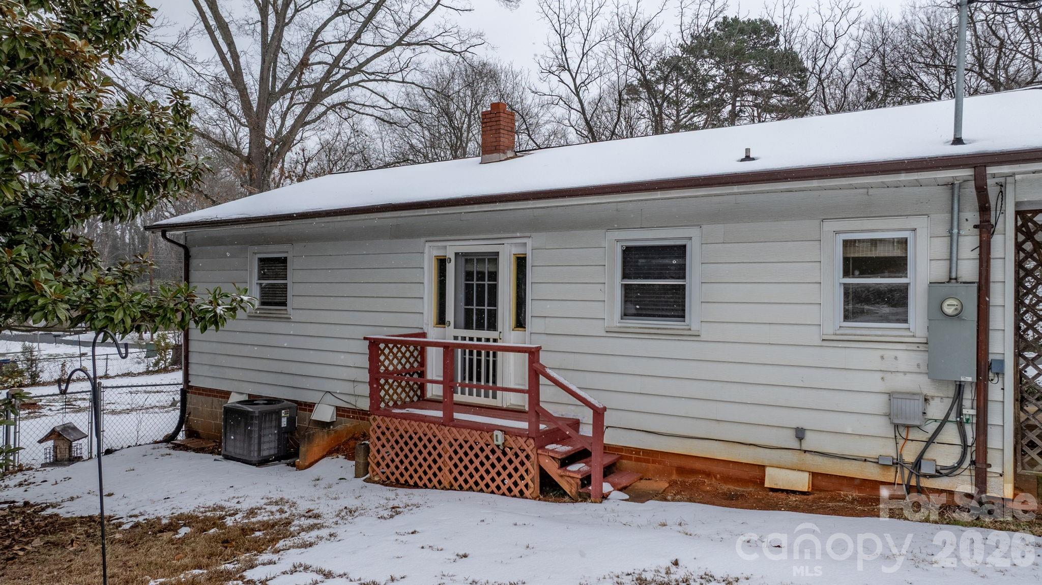 203 3rd Avenue Northeast Conover, NC 28613 - Photo 8 of 30 a view of a house with a patio and backyard