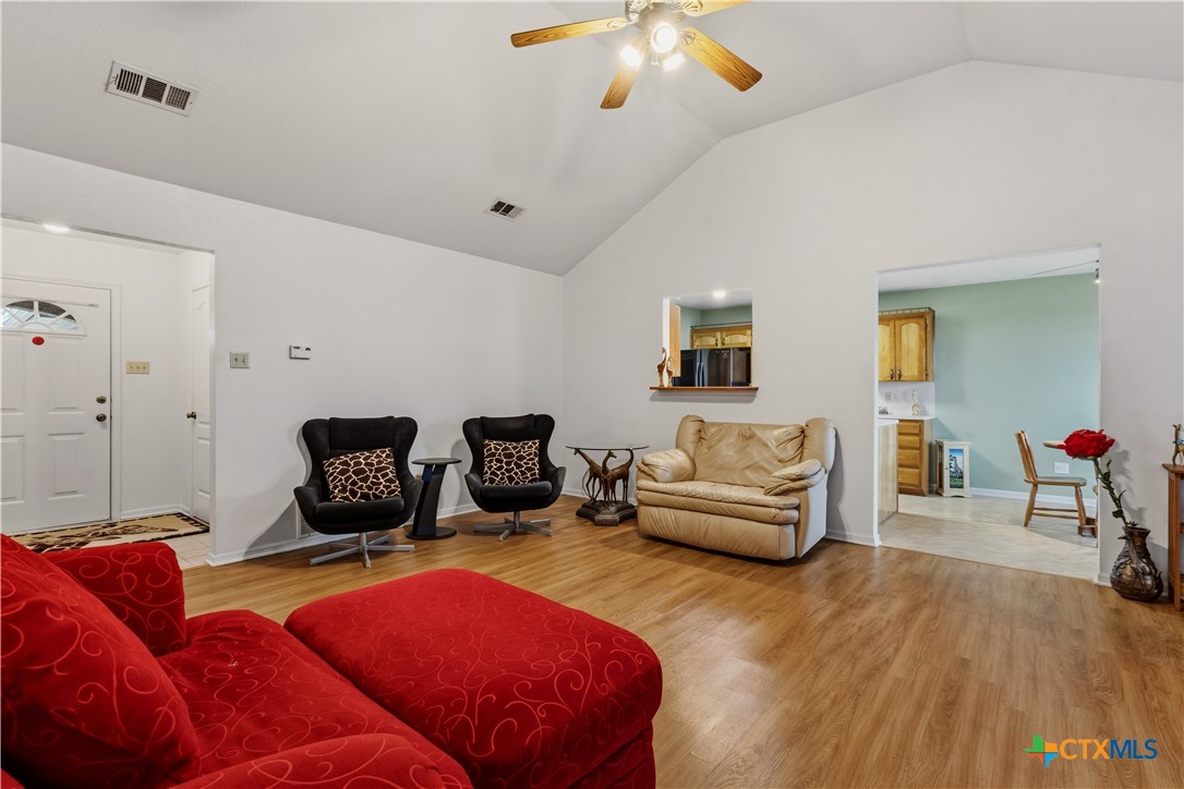 261 County Road 4963 Kempner, TX 76539 - Photo 12 of 44 a living room with furniture and a flat screen tv