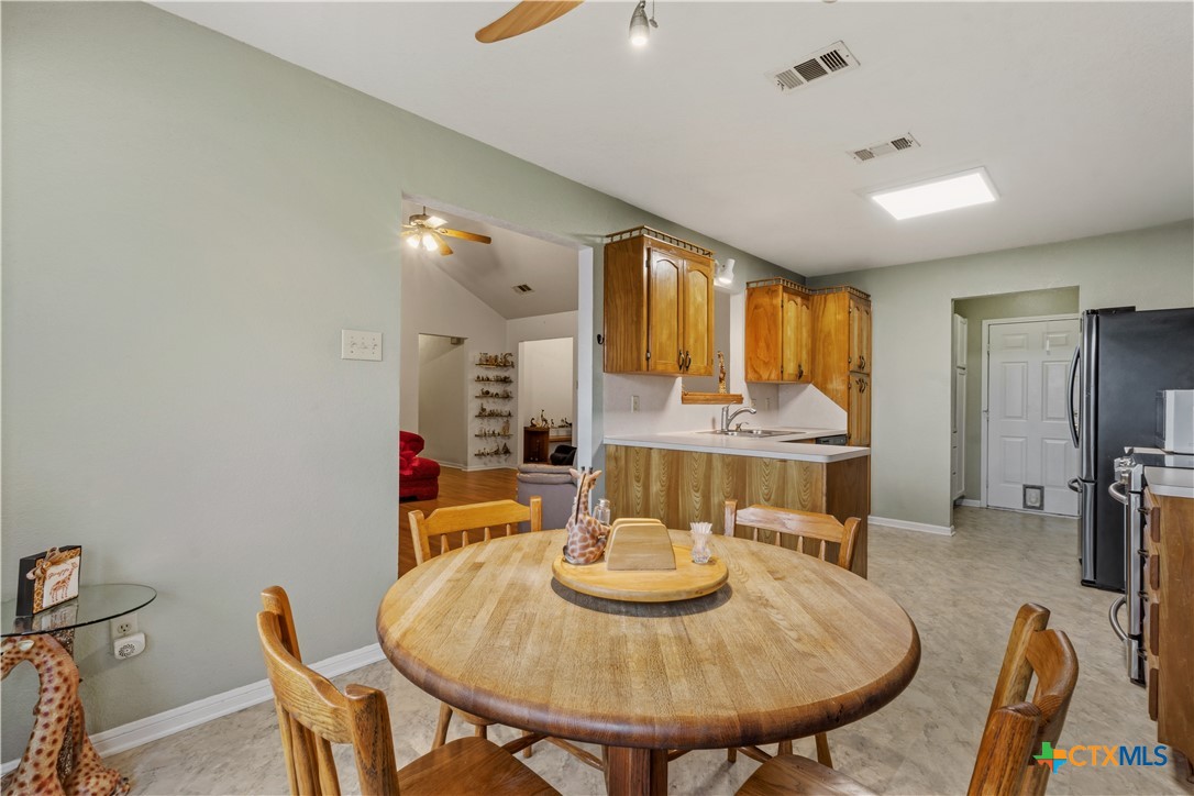 261 County Road 4963 Kempner, TX 76539 - Photo 16 of 44 a view of a dining room with furniture